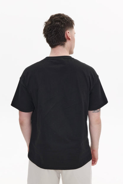 "PROUD PROCRASTINATOR" t-shirt in WASHED BLACK DLNSK 