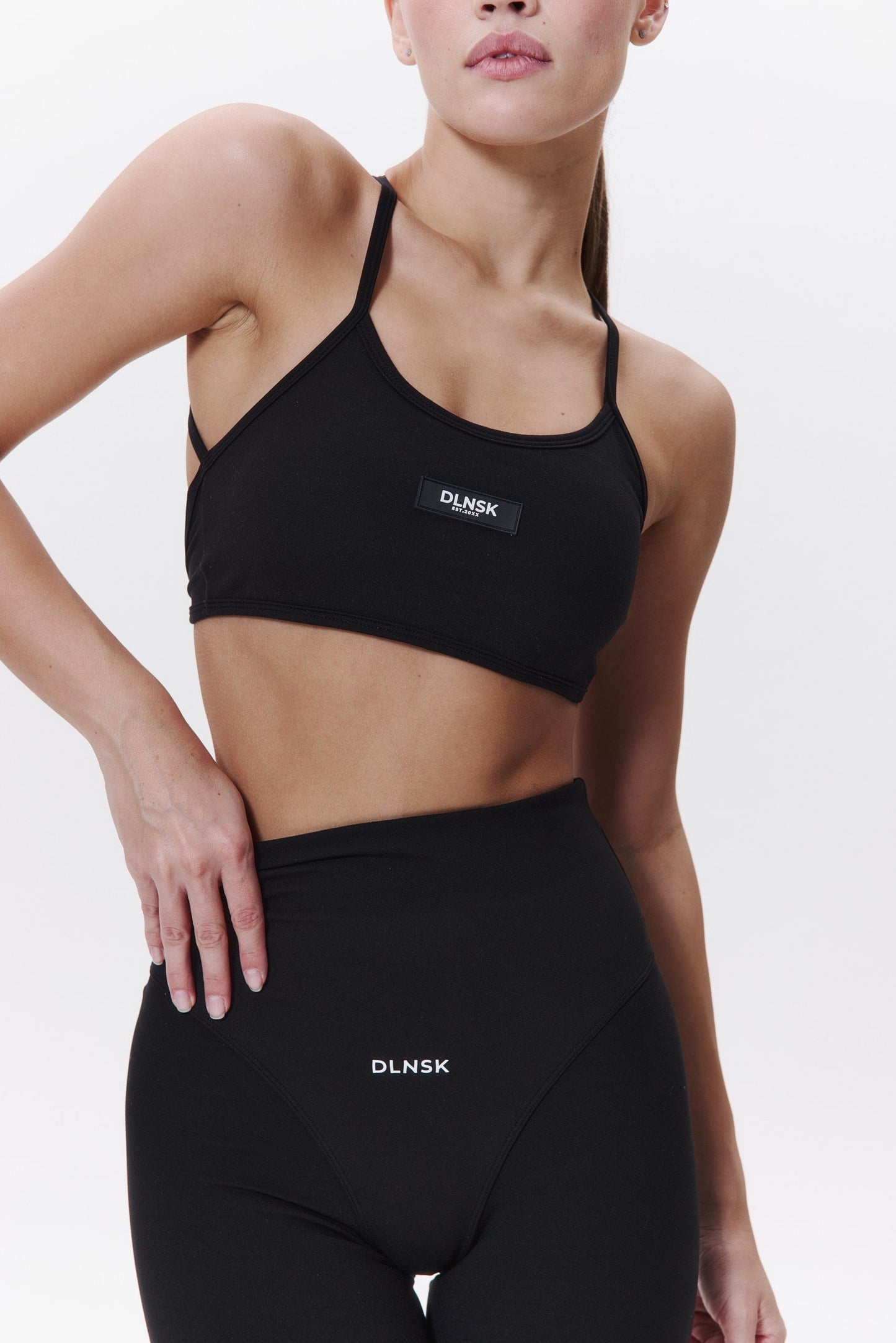 STRAPS TOP in BLACK Top DLNSK 