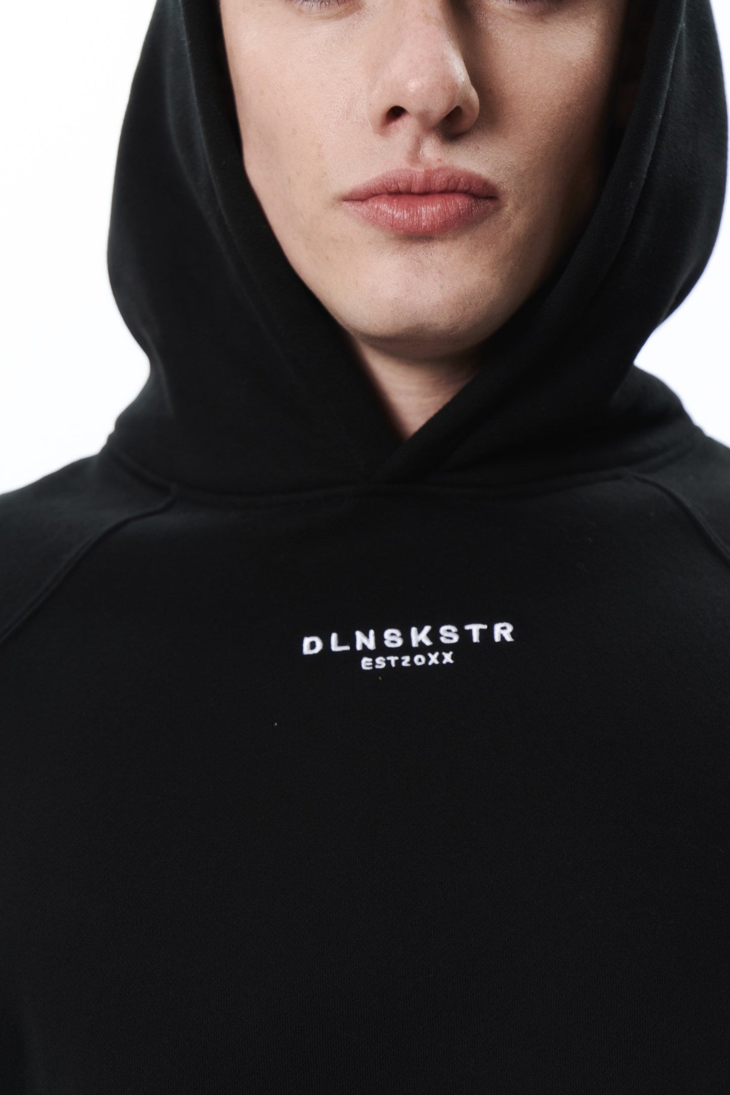 TRVL CLB base hoodie in BLACK DLNSK 