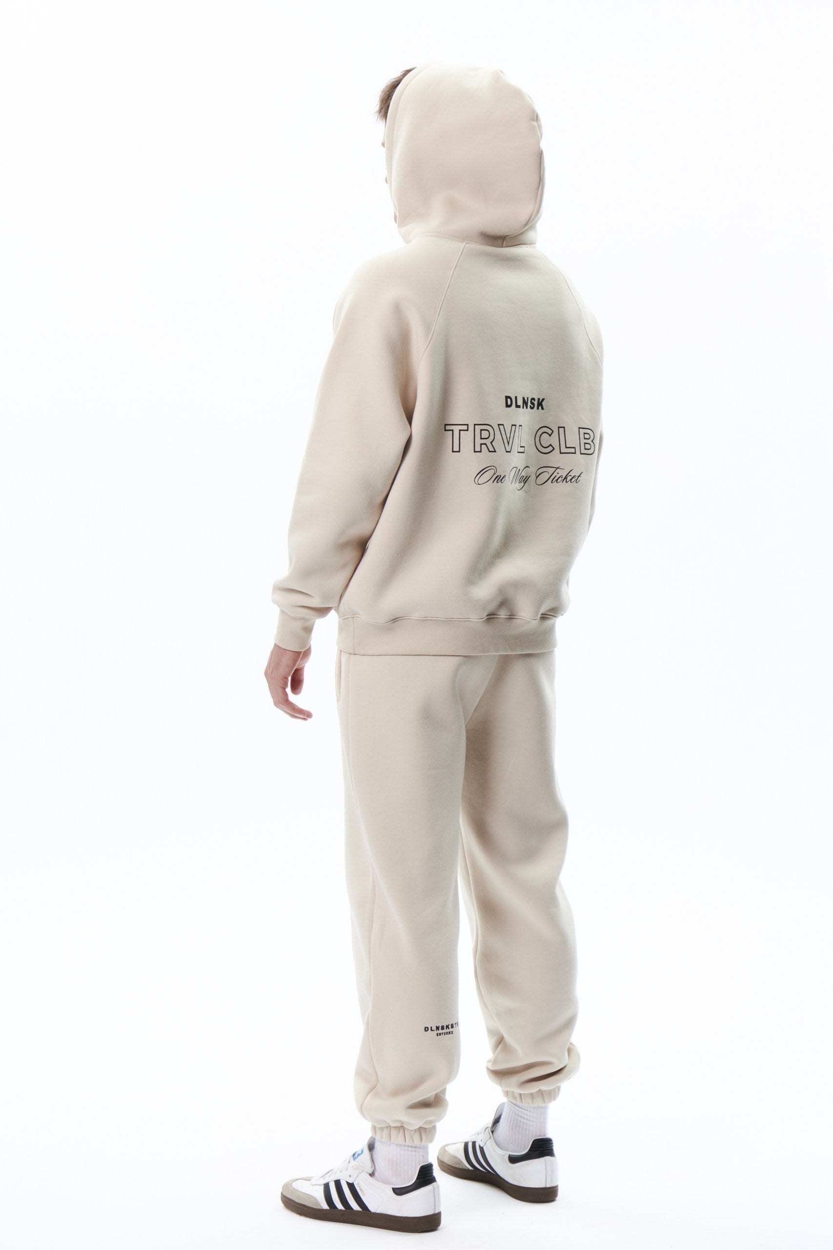 TRVL CLB base hoodie in COOKIE DLNSK 