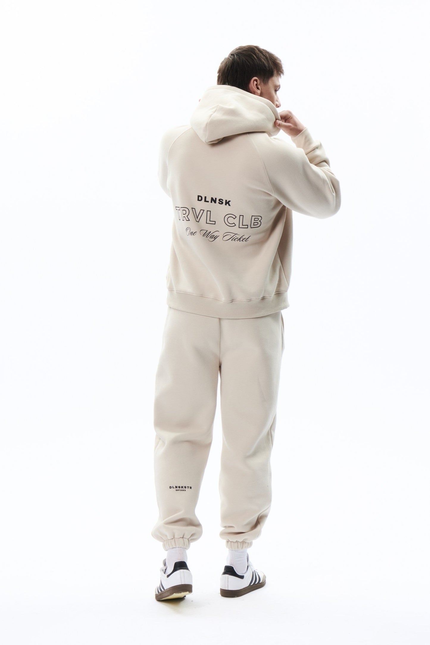 TRVL CLB base hoodie in COOKIE DLNSK 